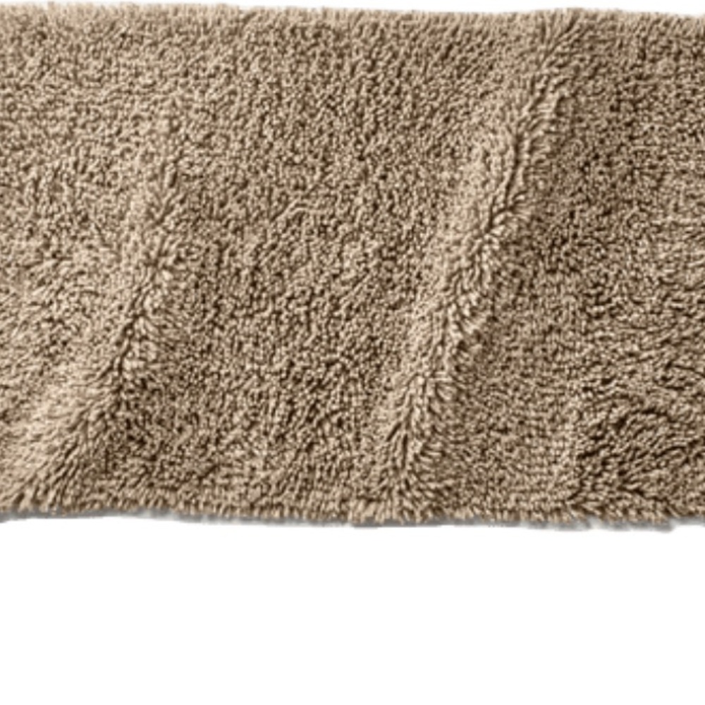 Cozy Tan Shag Rug CASALUNA 21-inch x 34inch Mélange Looped Bath Rug in
Dark Sand